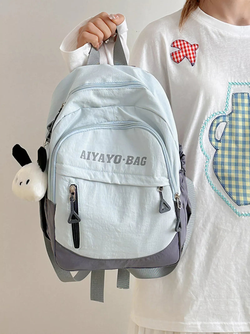 Blue color block nylon backpack front view