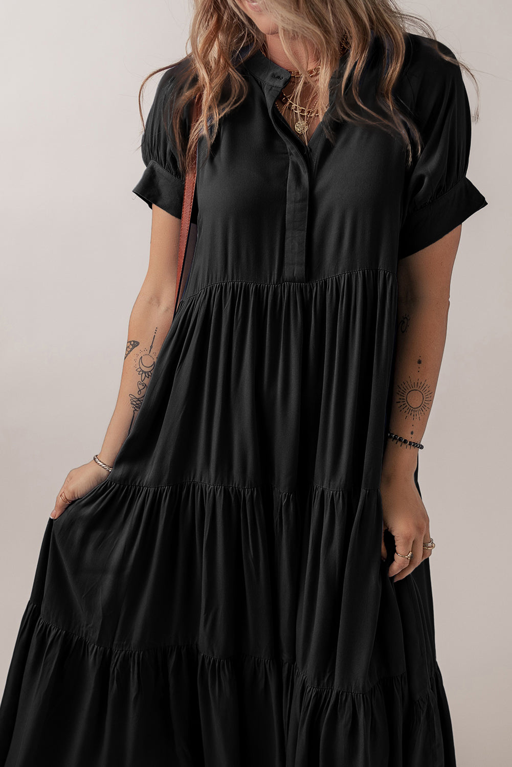 Long flared black maxi dress side view