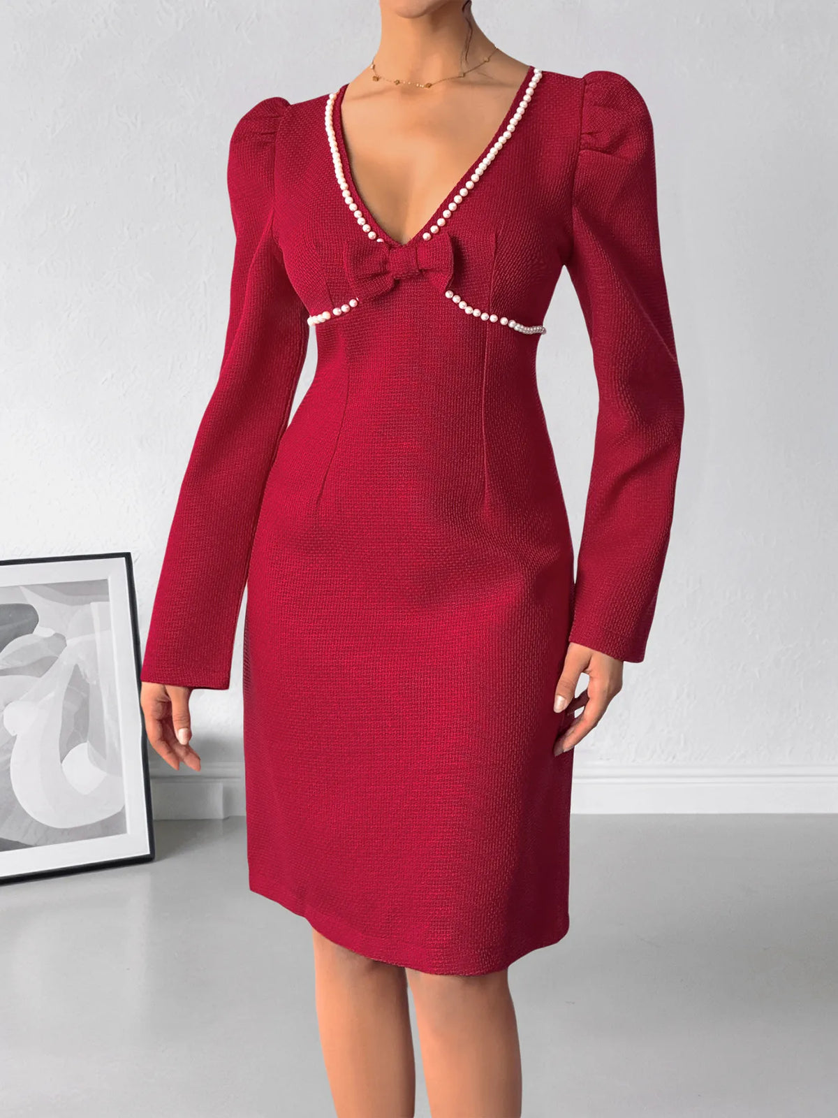 Red pearl trim V neck long sleeve bodycon dress side view