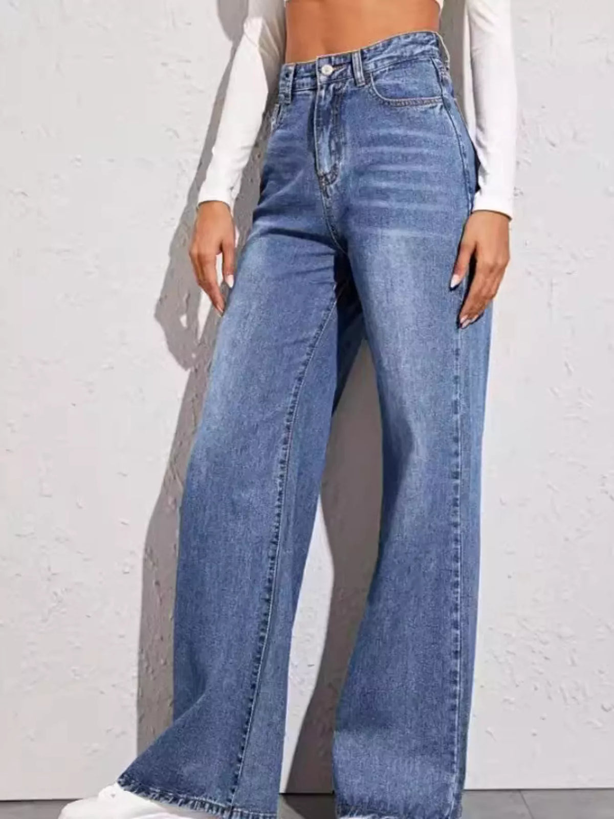 Blue wide leg denim jeans side profile