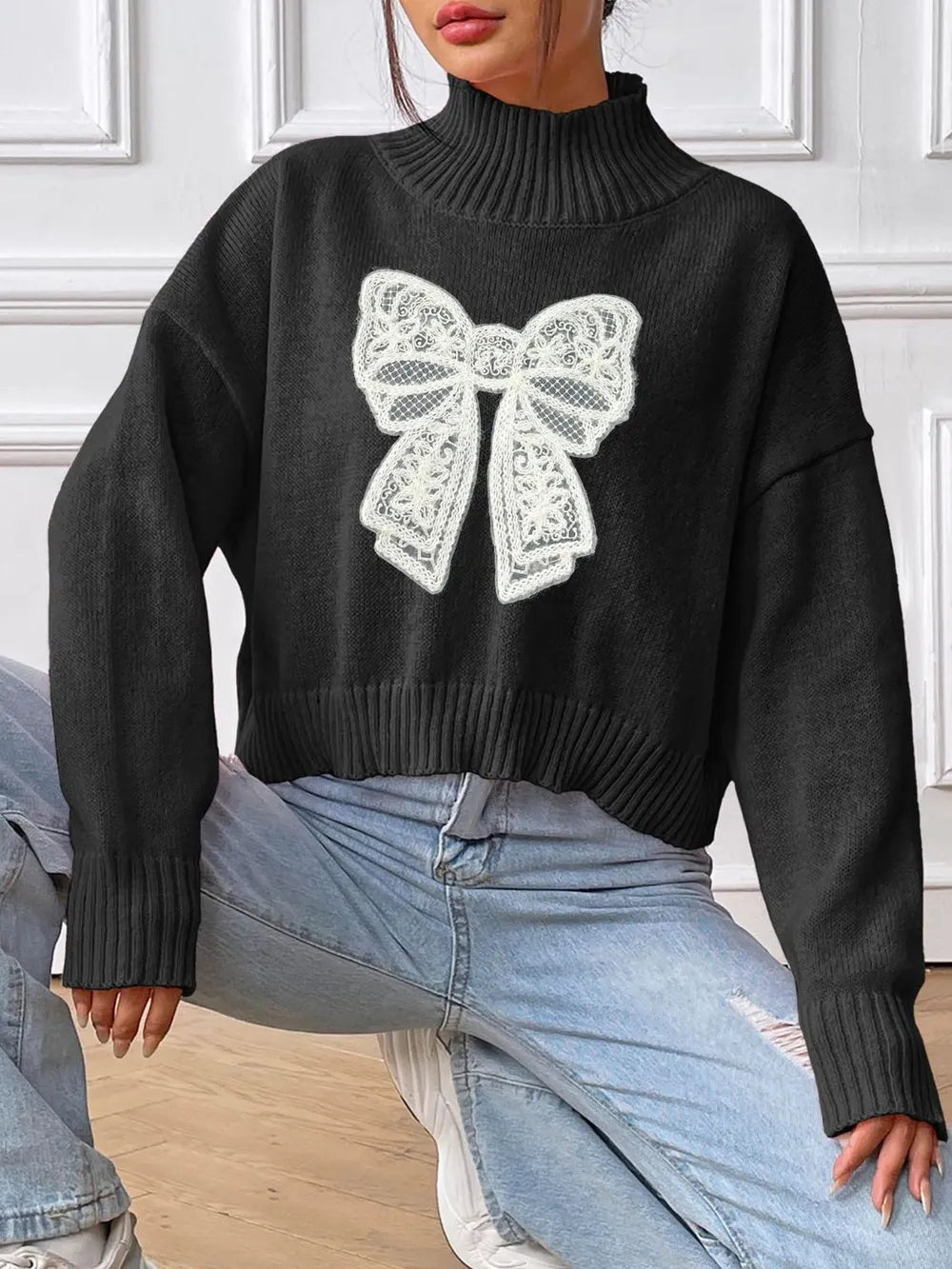 Bow detail turtleneck sweater side view