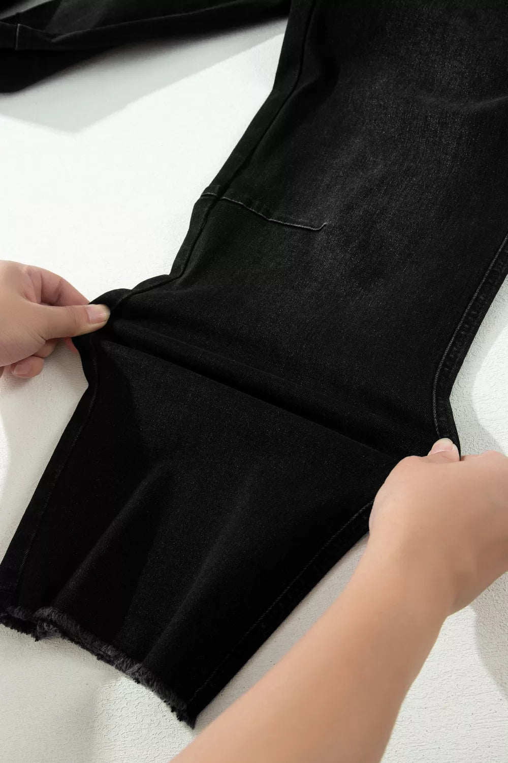 Black frayed cropped jeans ankle detail