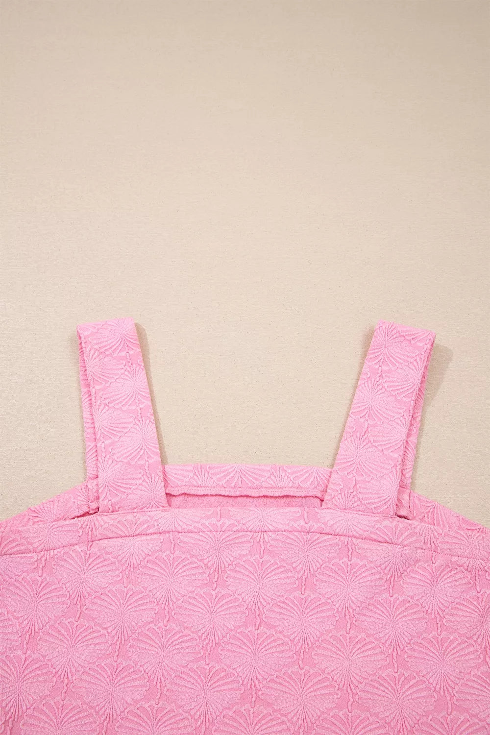 Pink textured tank styled with denim