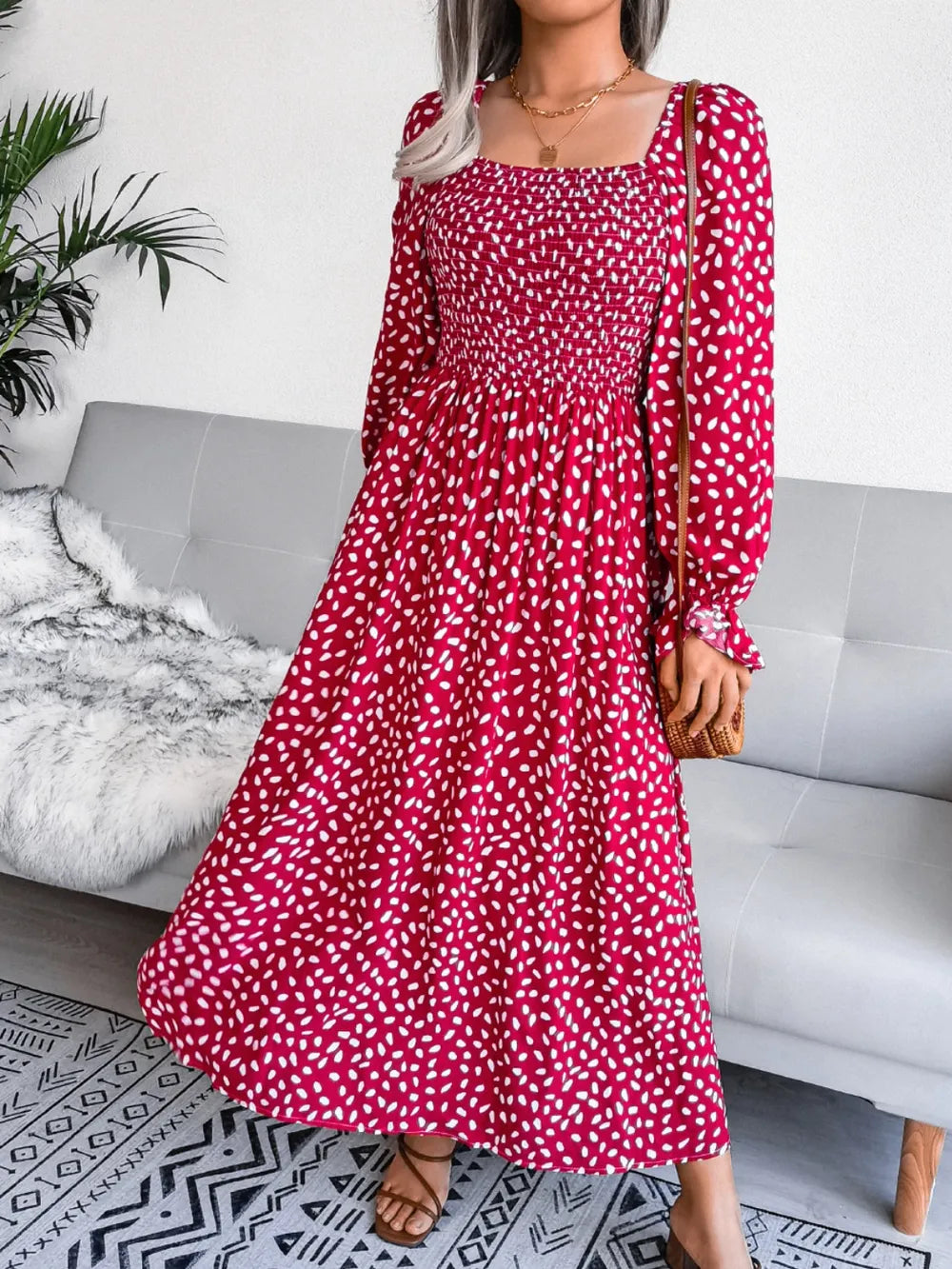 Smocked square neck flounce sleeve dress movement shot