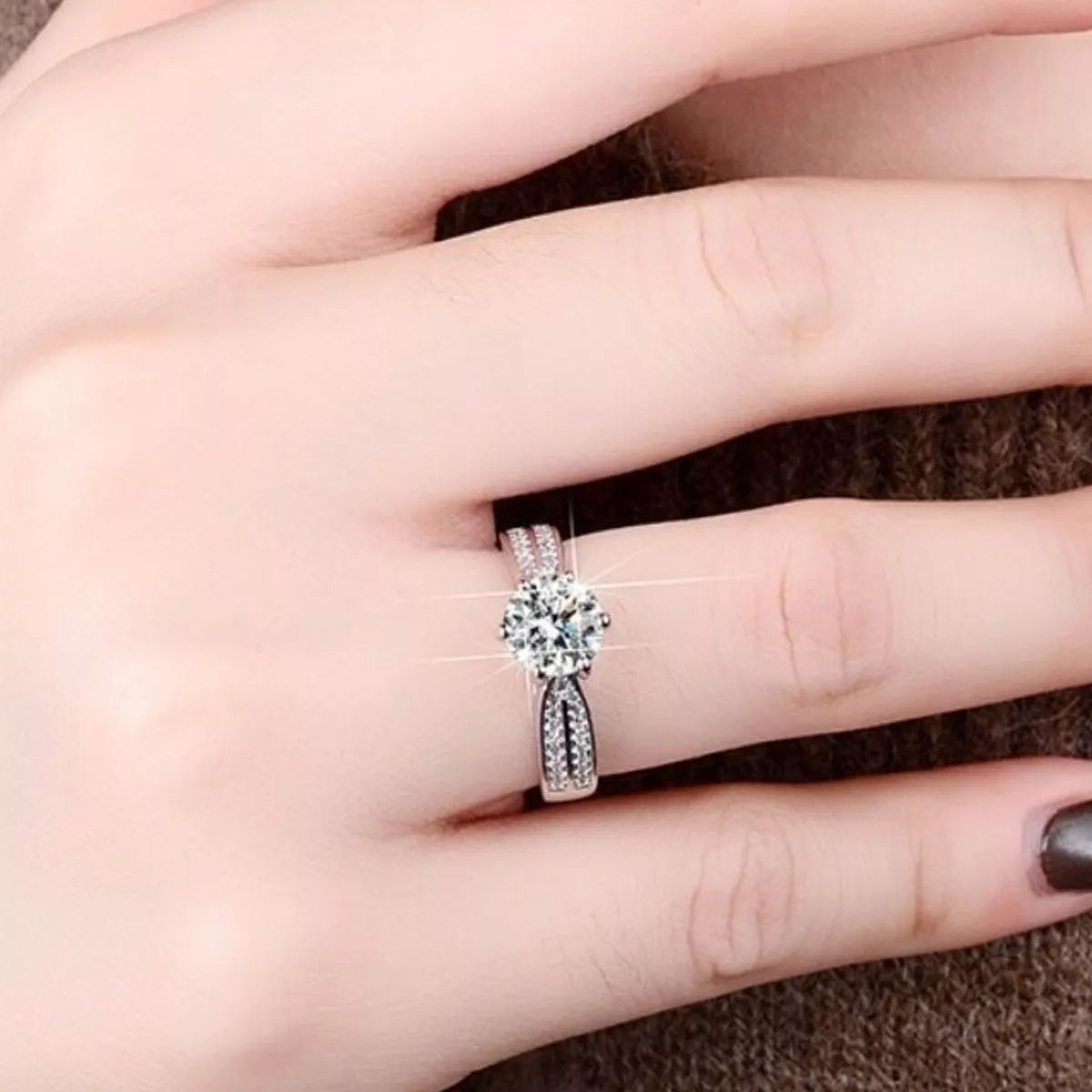 Moissanite geometric ring in sterling silver shown from the front