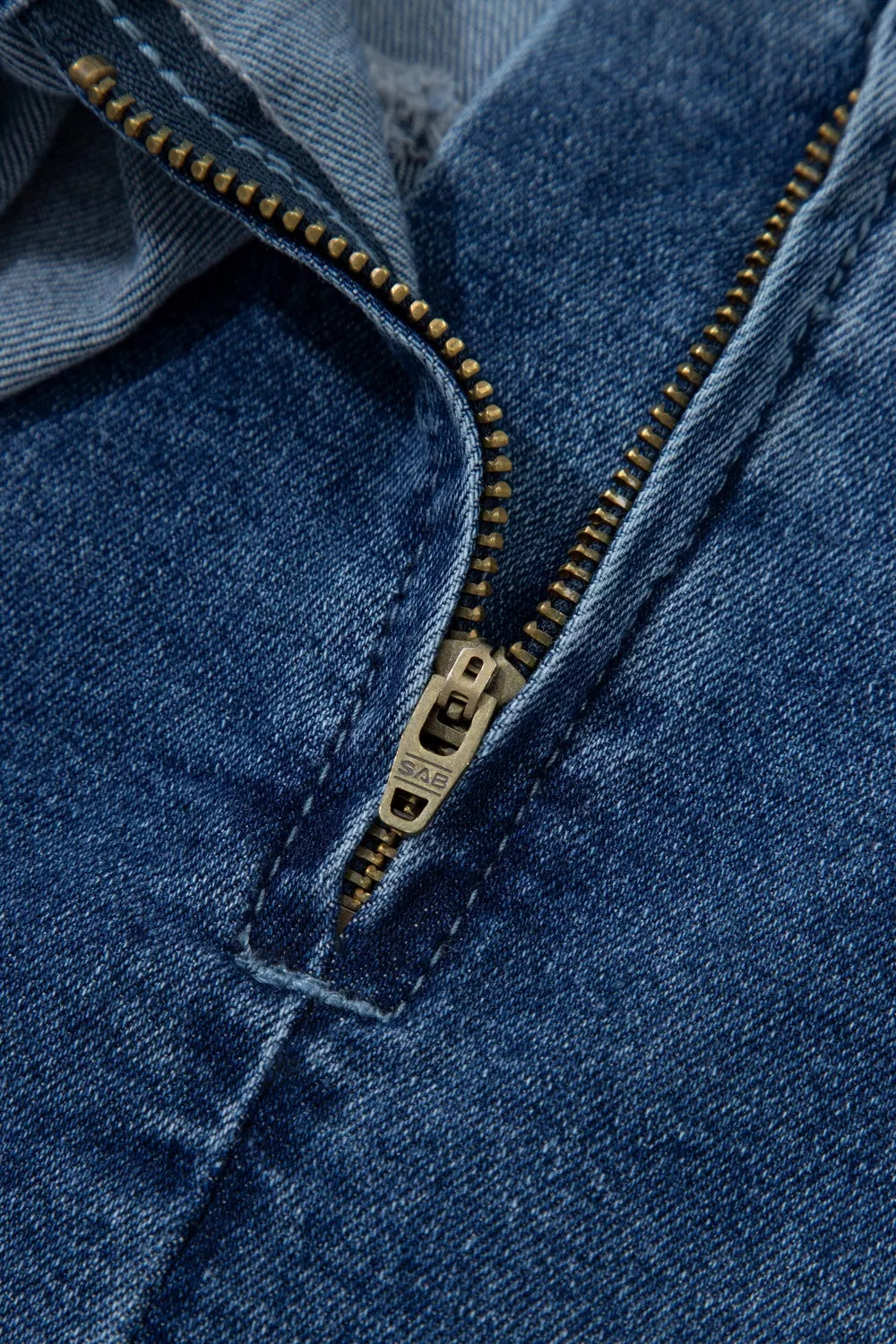Medium wash wrapped tie waist denim skort styled view