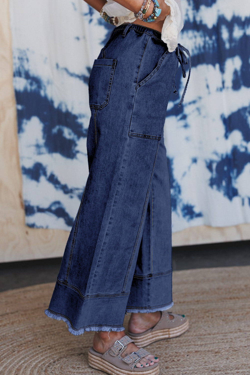 Wide leg drawstring waist jeans close fit view