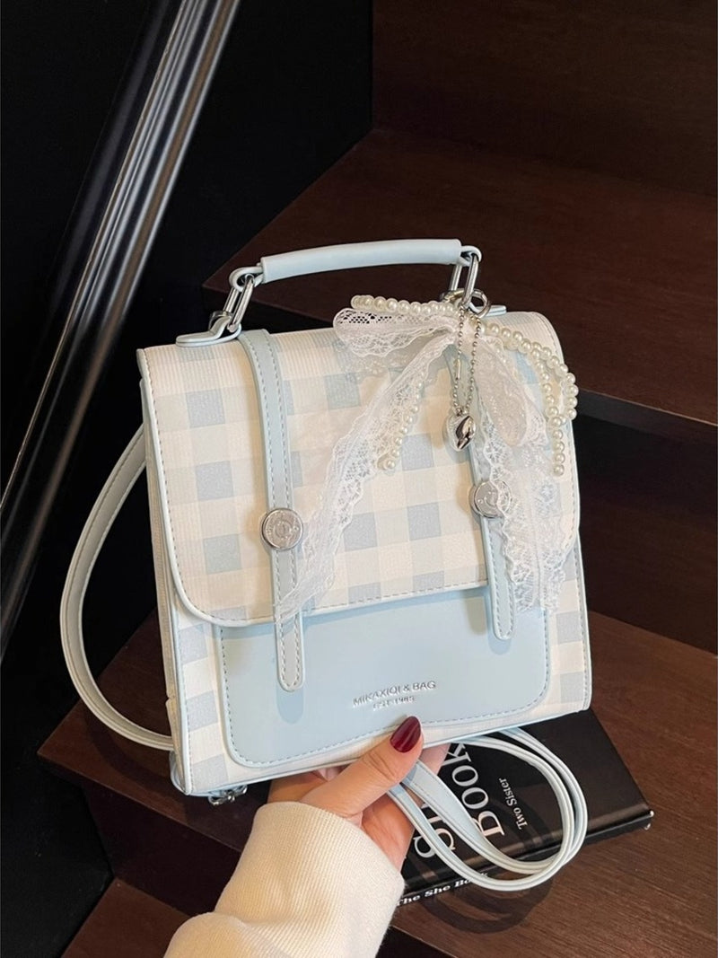 Blue plaid mini faux leather backpack front view