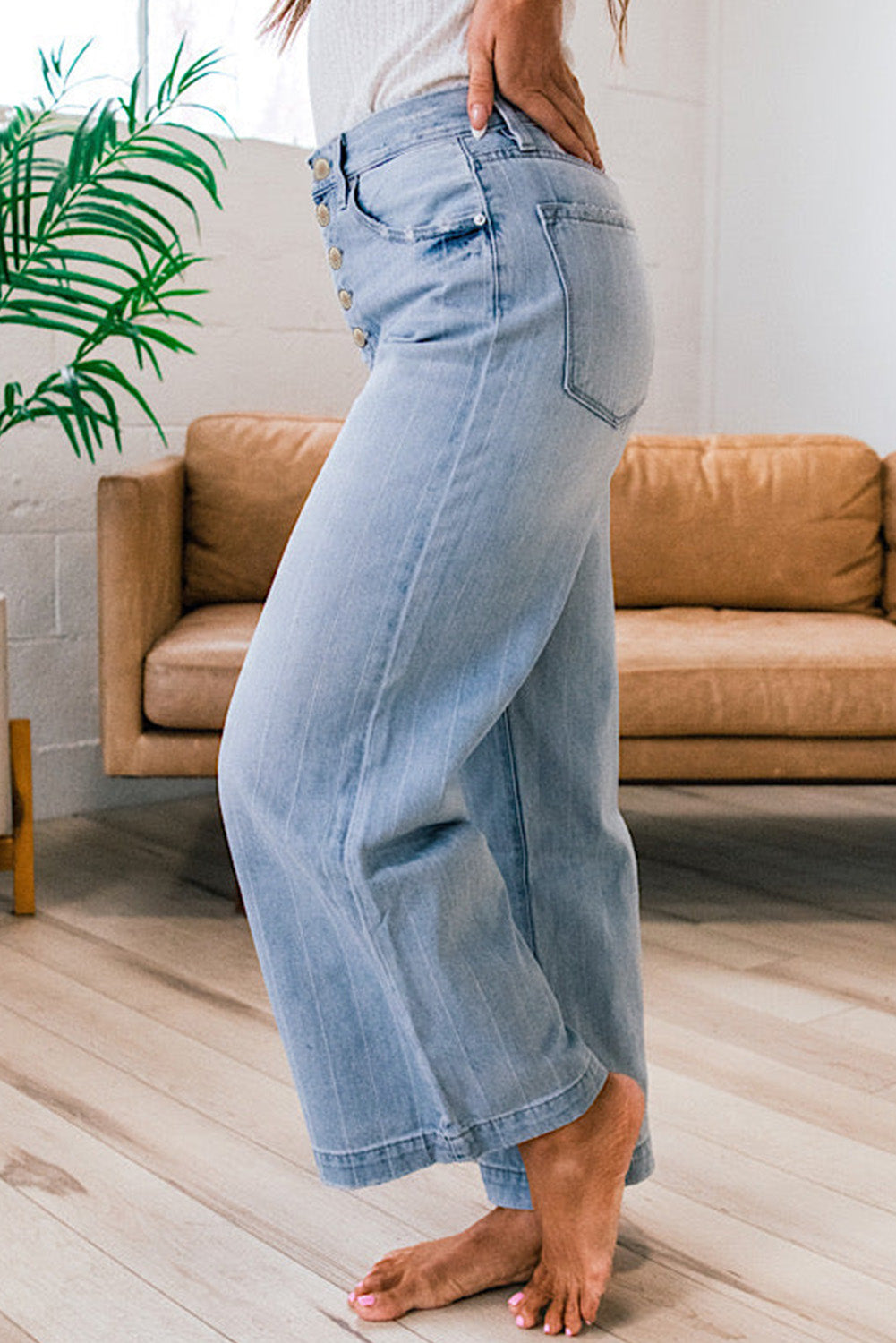 Blue wide leg jeans side view