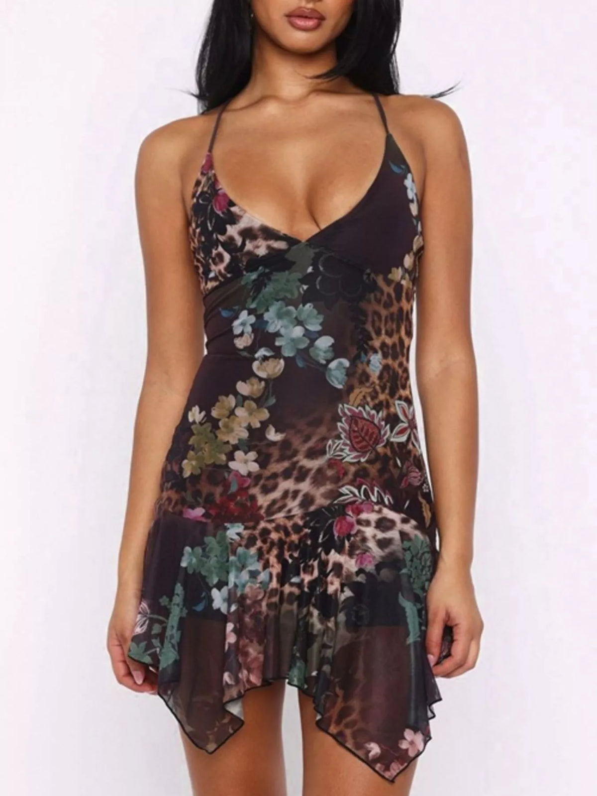 Asymmetrical ruffled hem detail on the mini dress