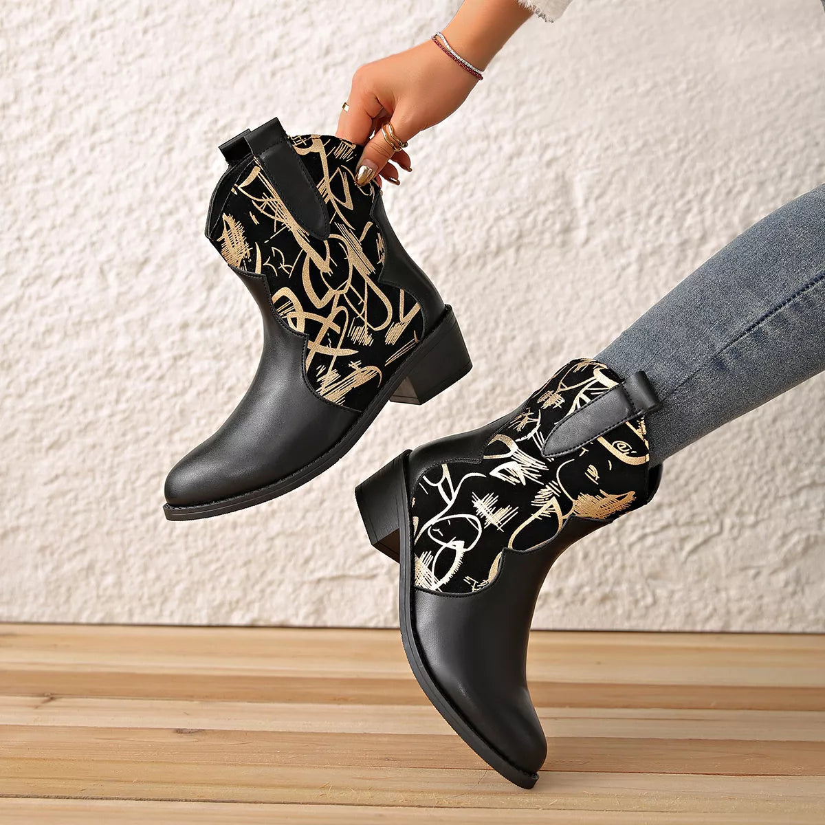 Black point toe block heel boots close up detail