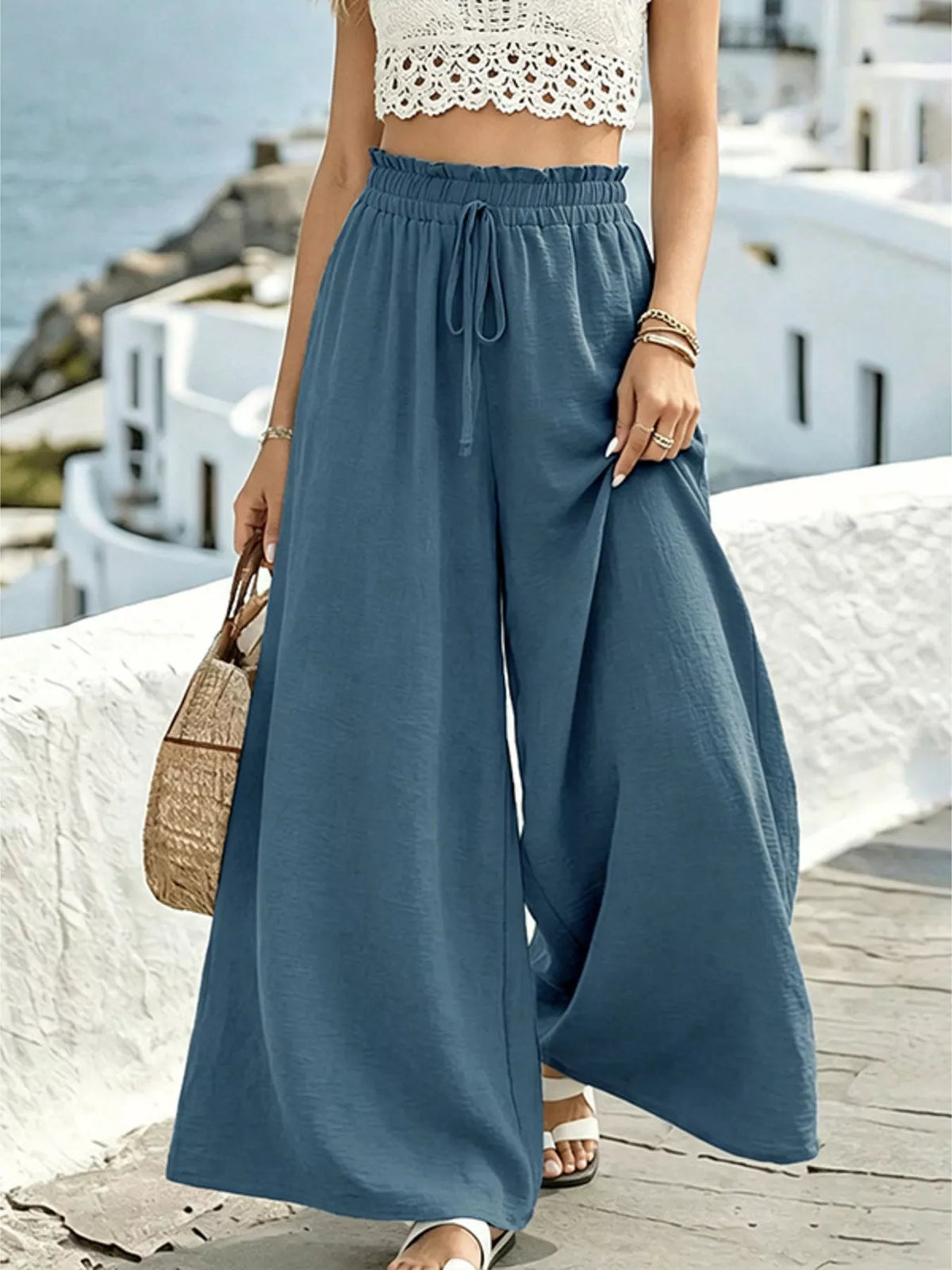 Full outfit view of wide leg drawstring trousers