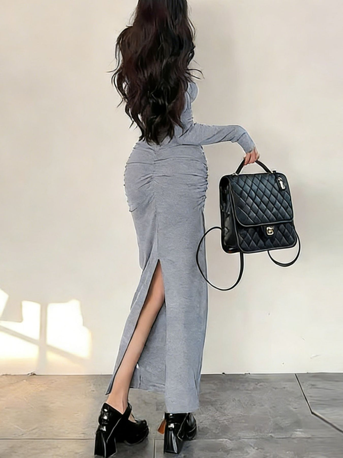 Ruched long sleeve bodycon maxi dress with slit detail view