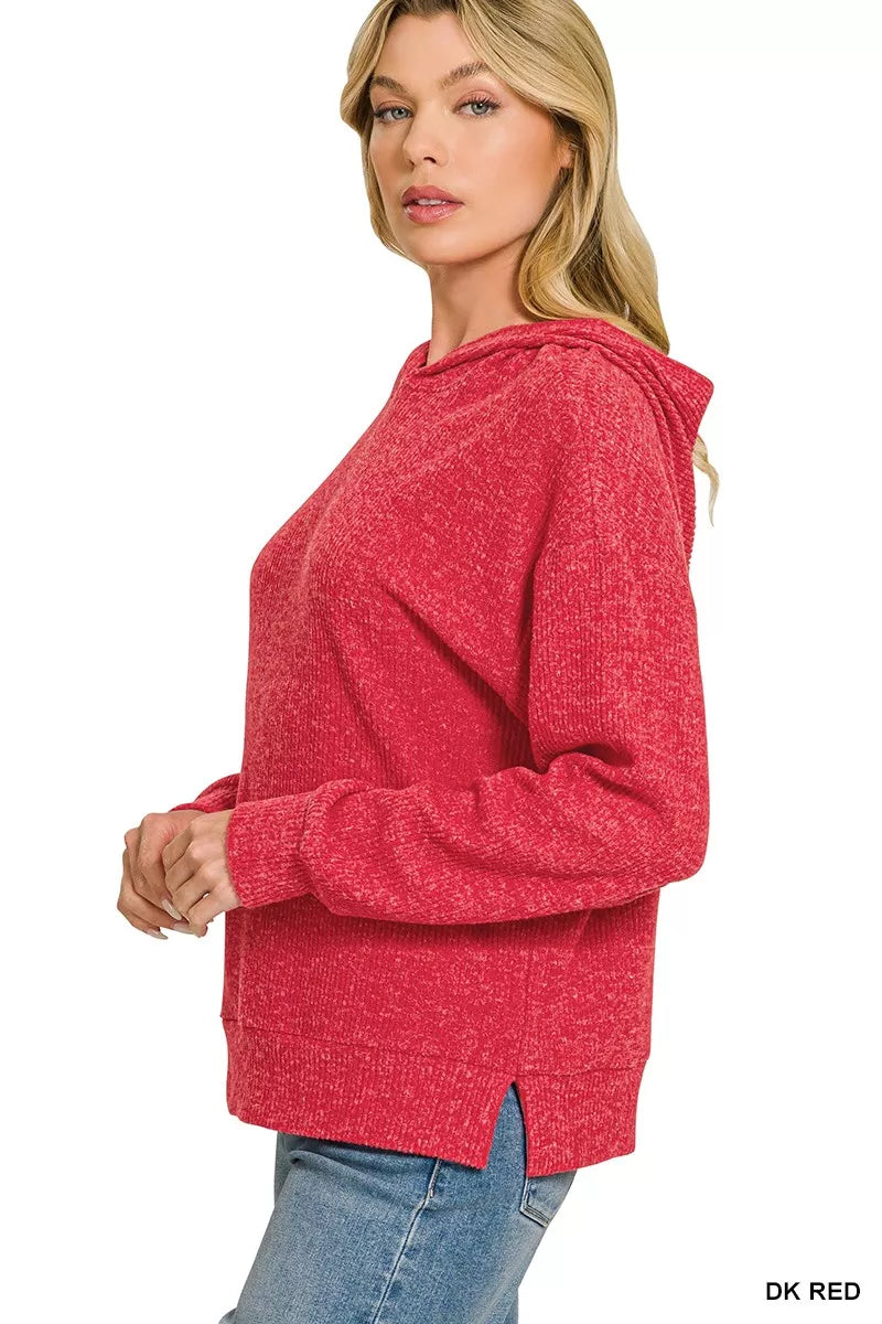 Front view of the dark red pullover hoodie on a model