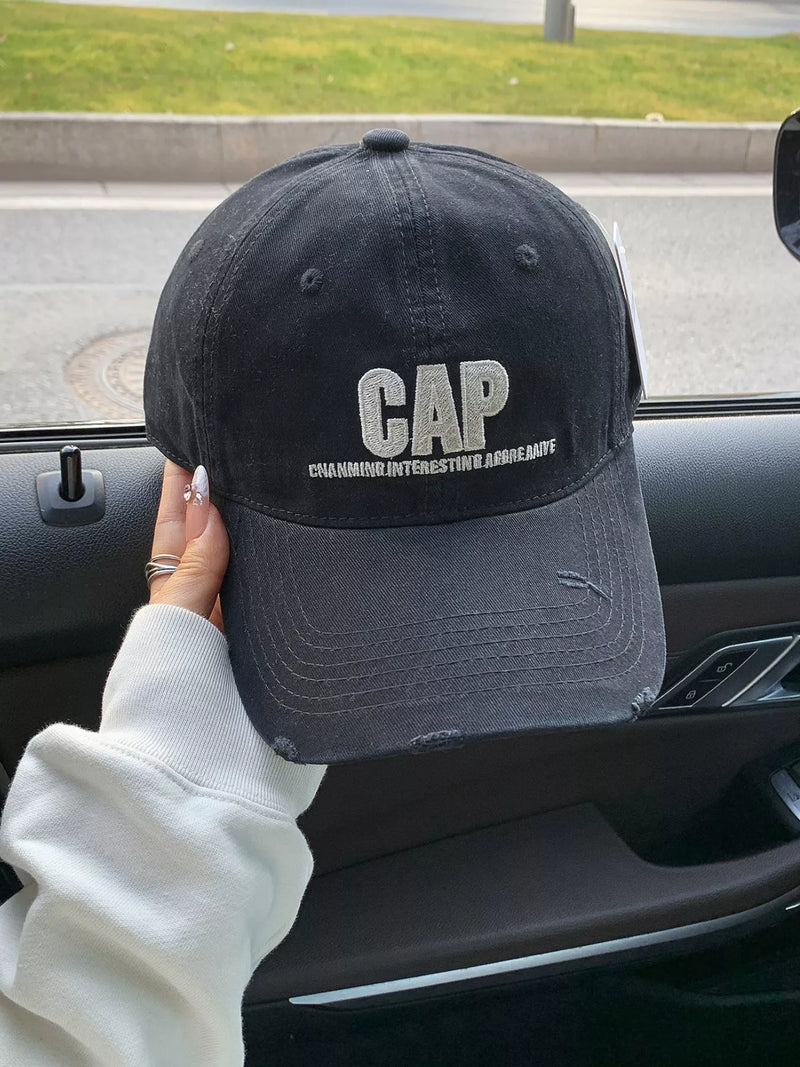 Distressed embroidered baseball cap in cotton, front view