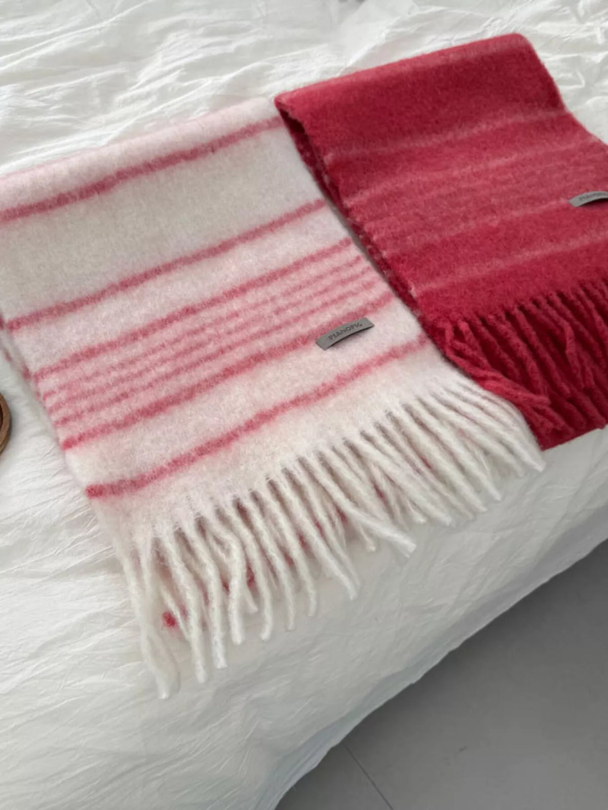 Striped fringe scarf draped for a relaxed vibe