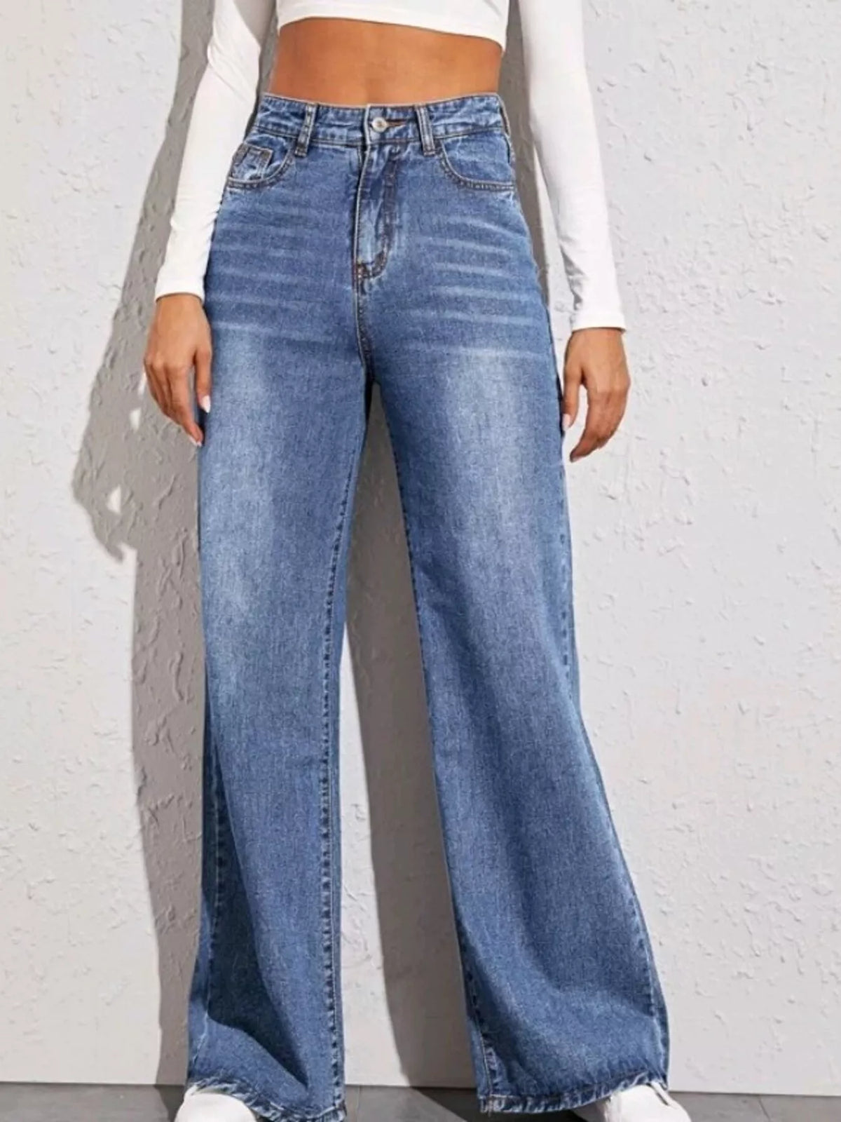 High waisted wide leg blue jeans front view