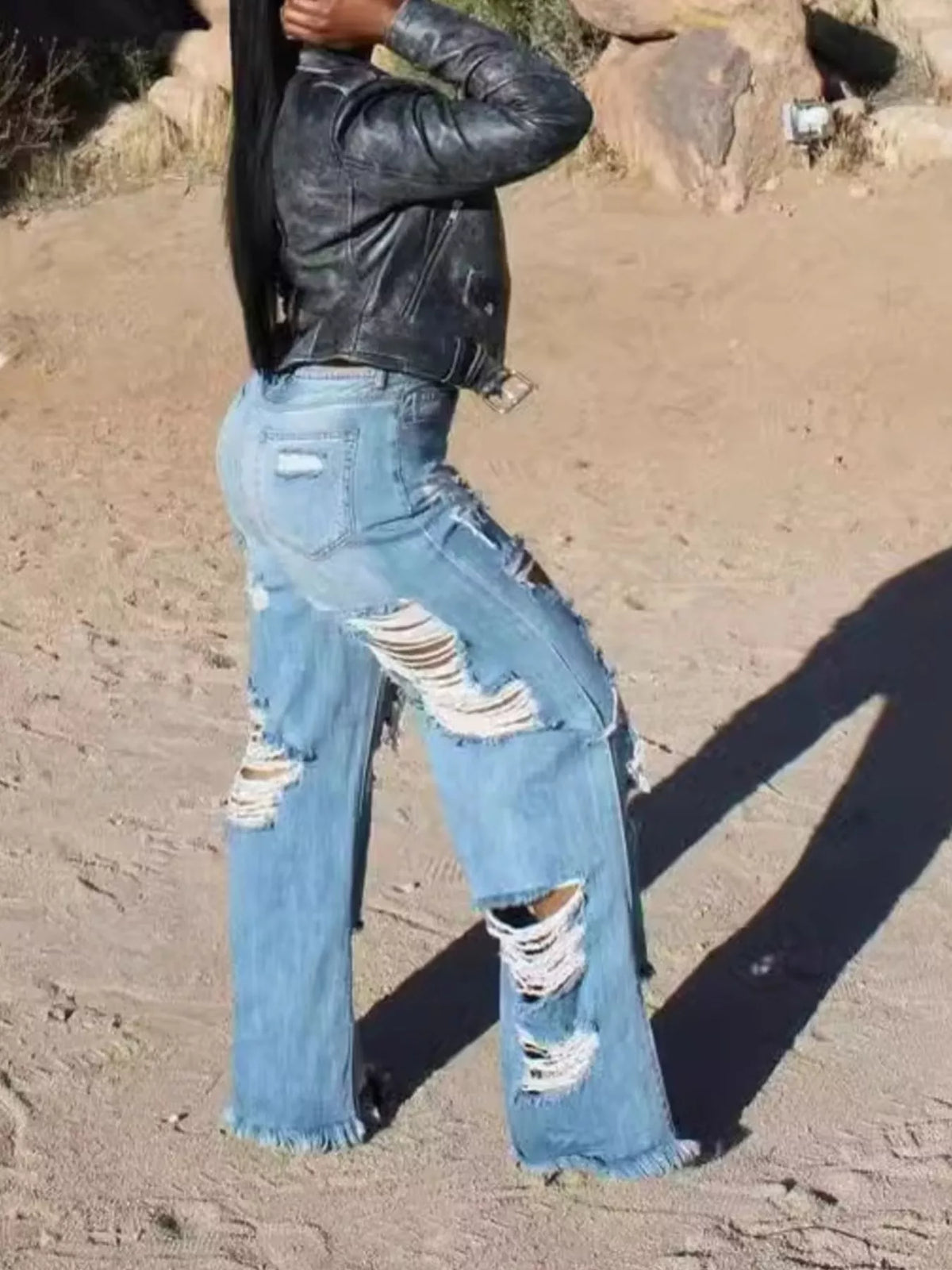 Casual distressed blue jeans close up fabric