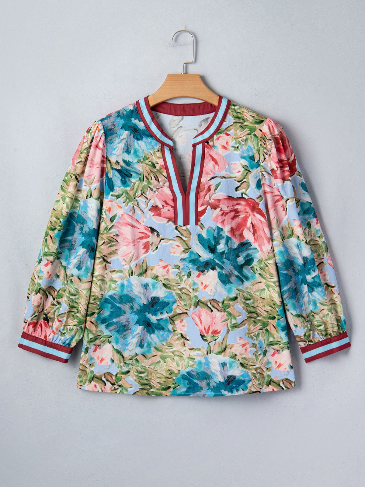 Contrast Trim V Neck Cuffed Bracelet Sleeve Floral Blouse on model
