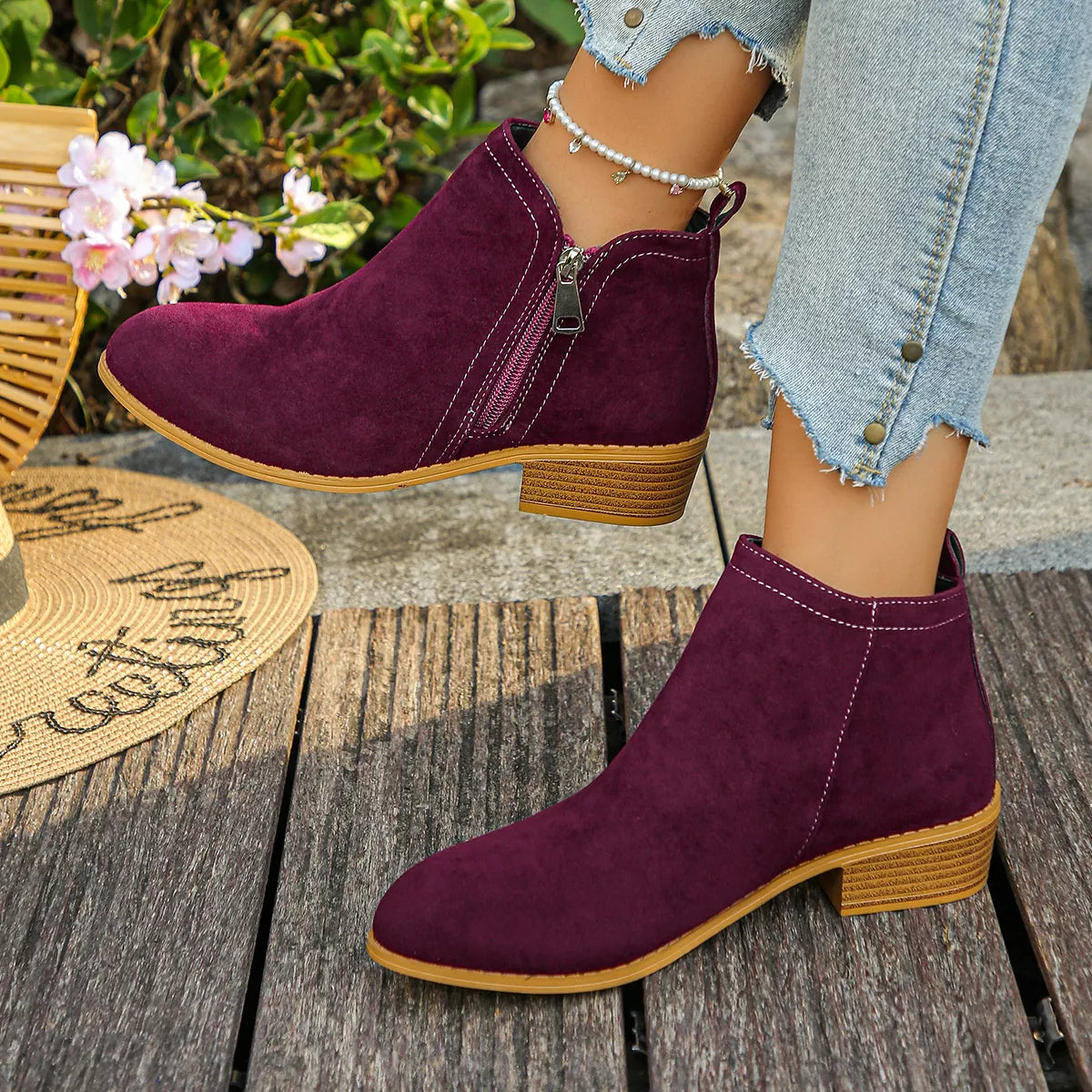 Point toe block heel boots, angled three quarter view