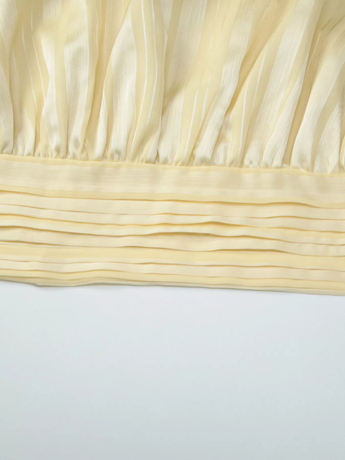 Full view of the Sable striped halter cami top