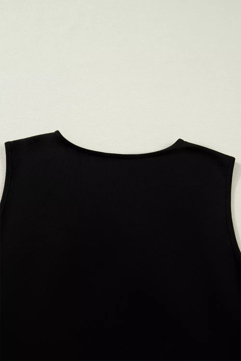 Black embroidered summer top styled with gold jewelry