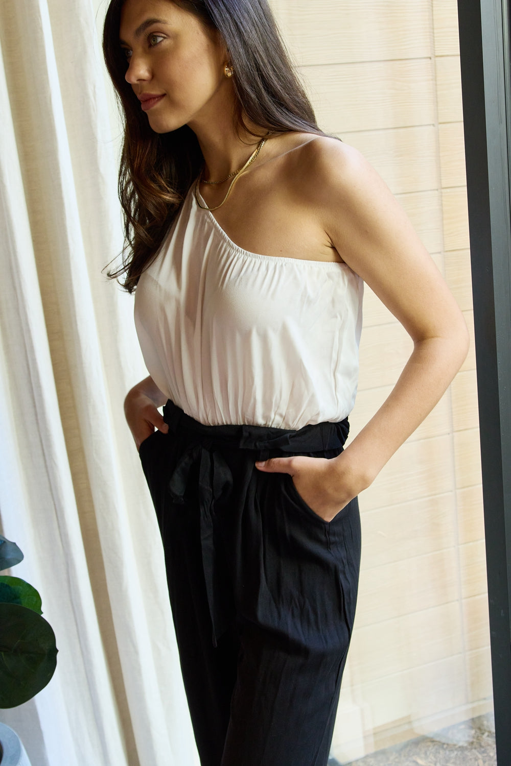 One Shoulder Jumpsuit in White and Black on model