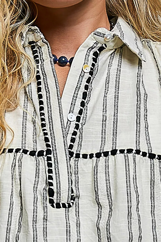 Striped top styled with high waisted denim