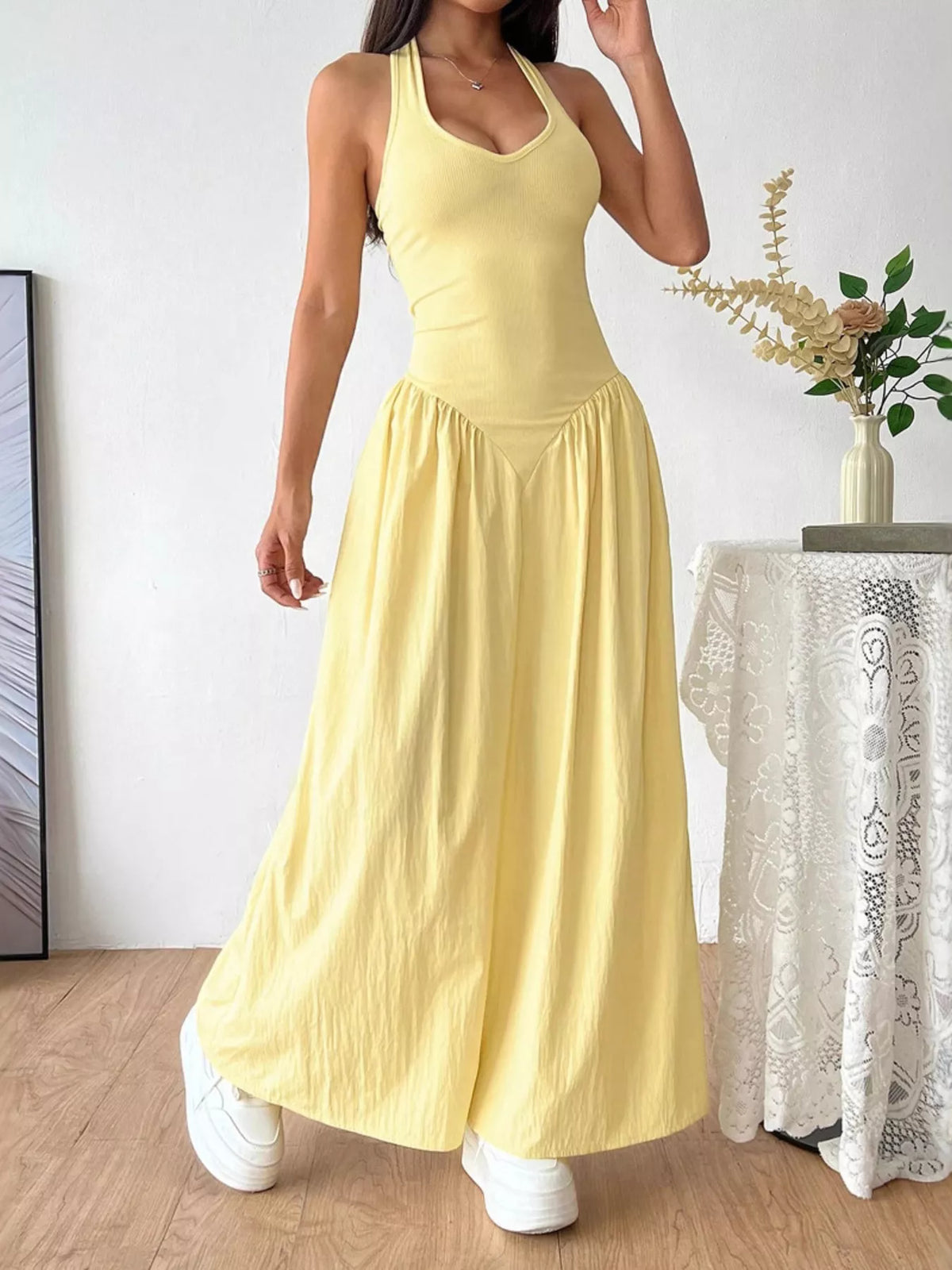 Ruched bodice detail on the long yellow dress