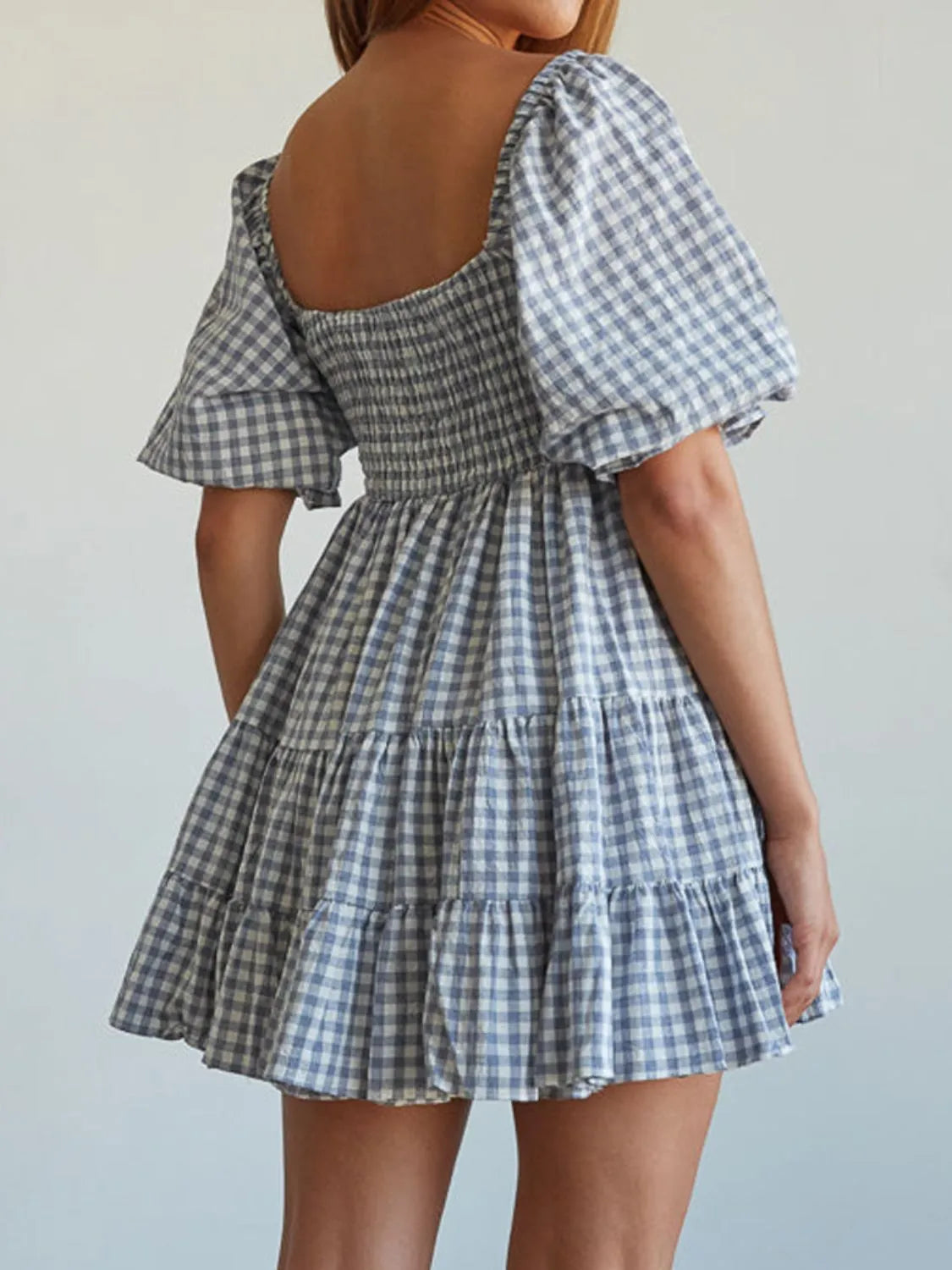 Ruffle Hem Plaid Mini Dress in Light Blue back view