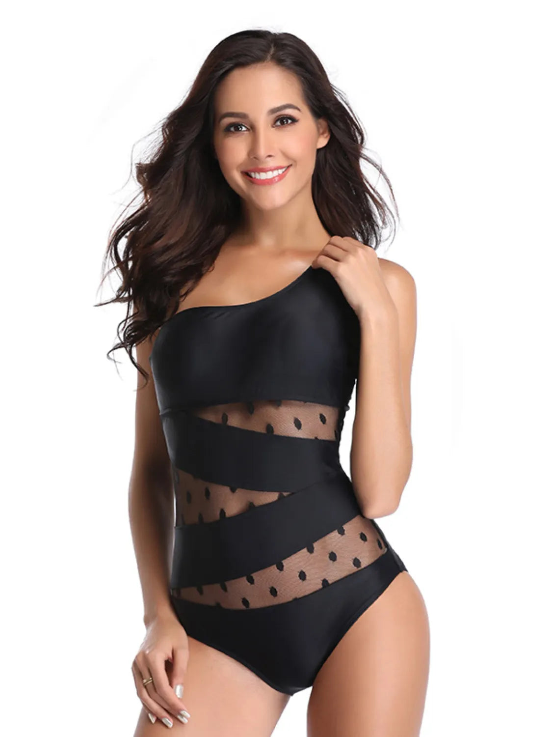Polka dot swimsuit styled for the beach