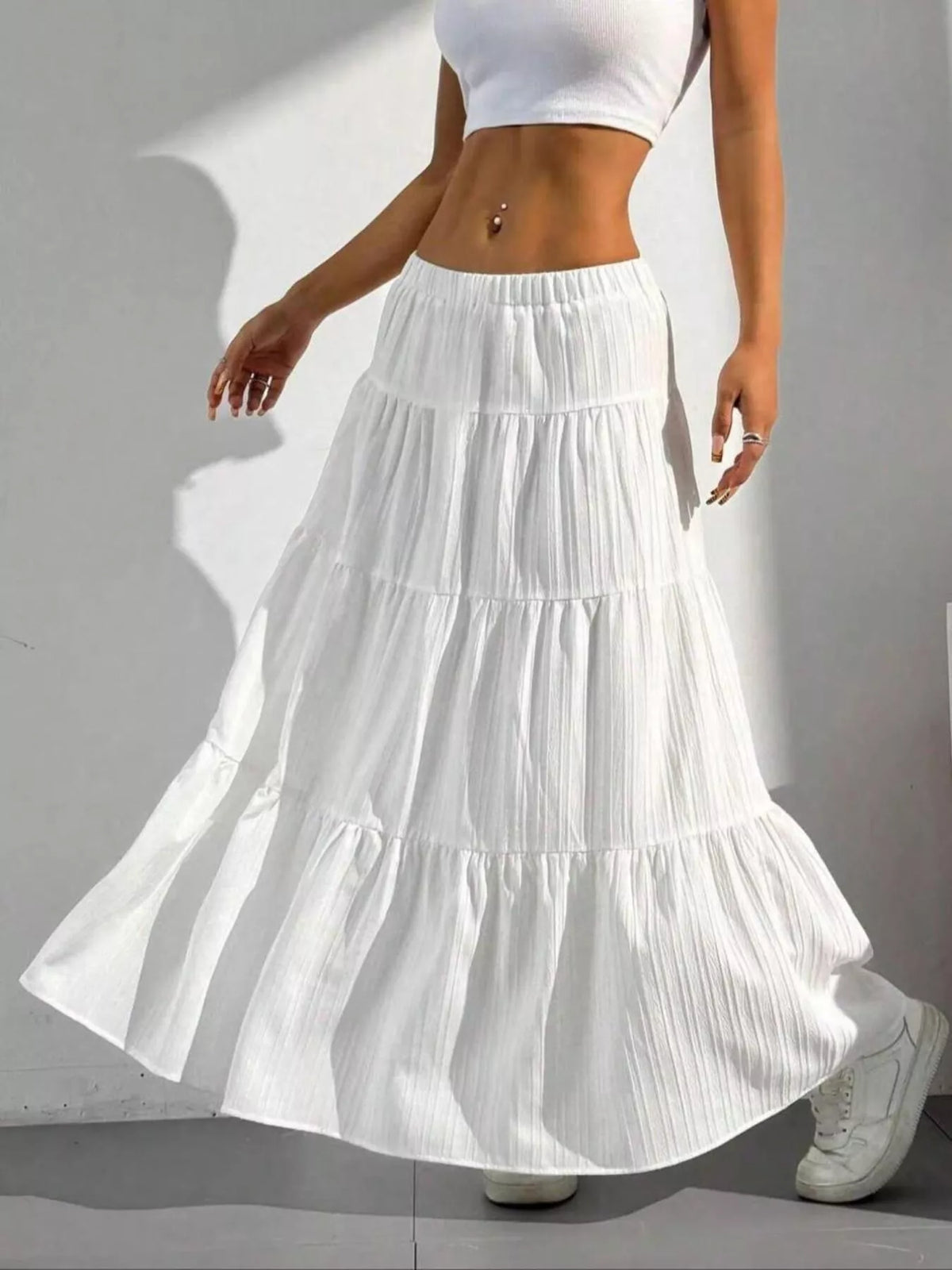 White tiered maxi skirt on model
