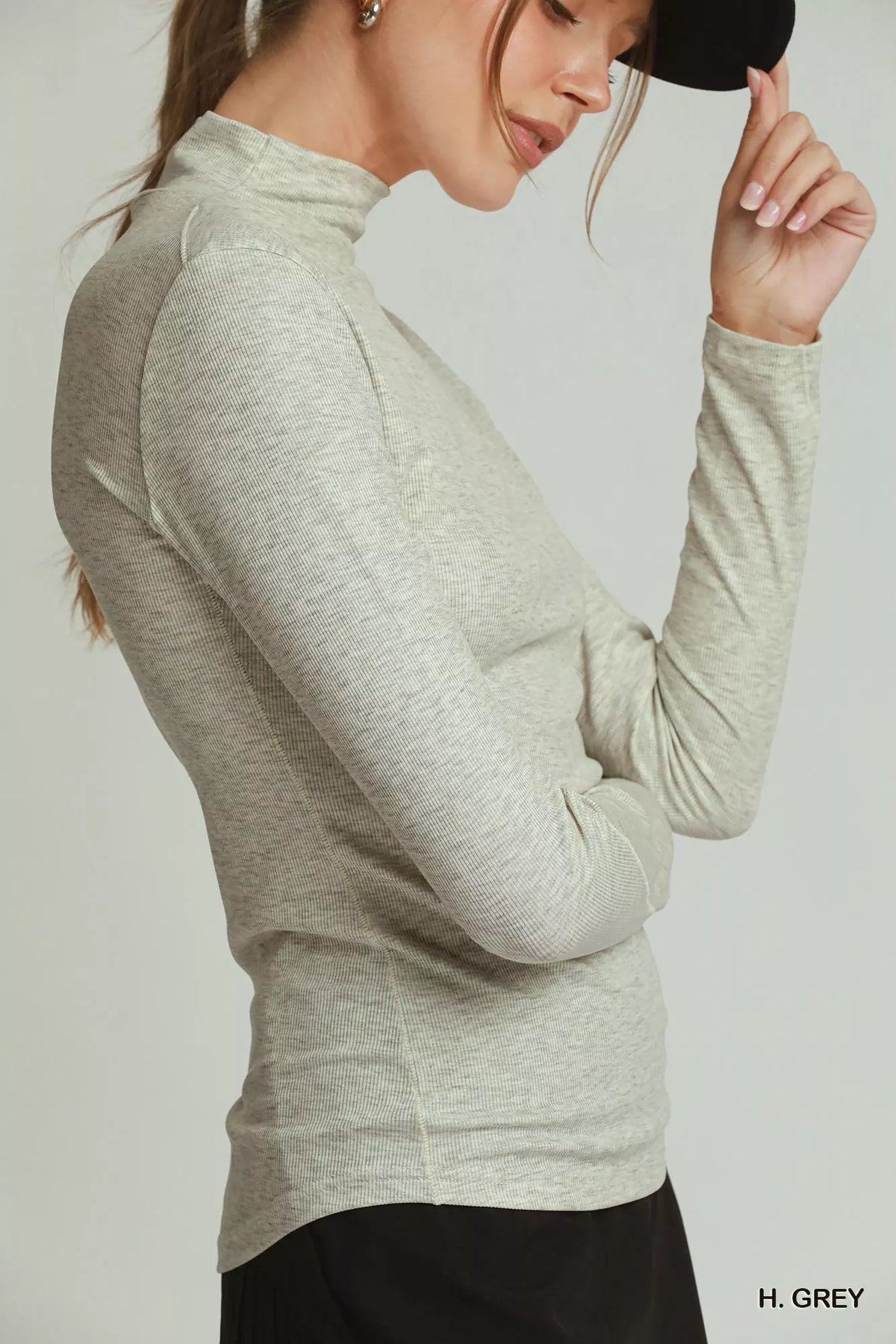 Front view of the mock neck top showing the neckline