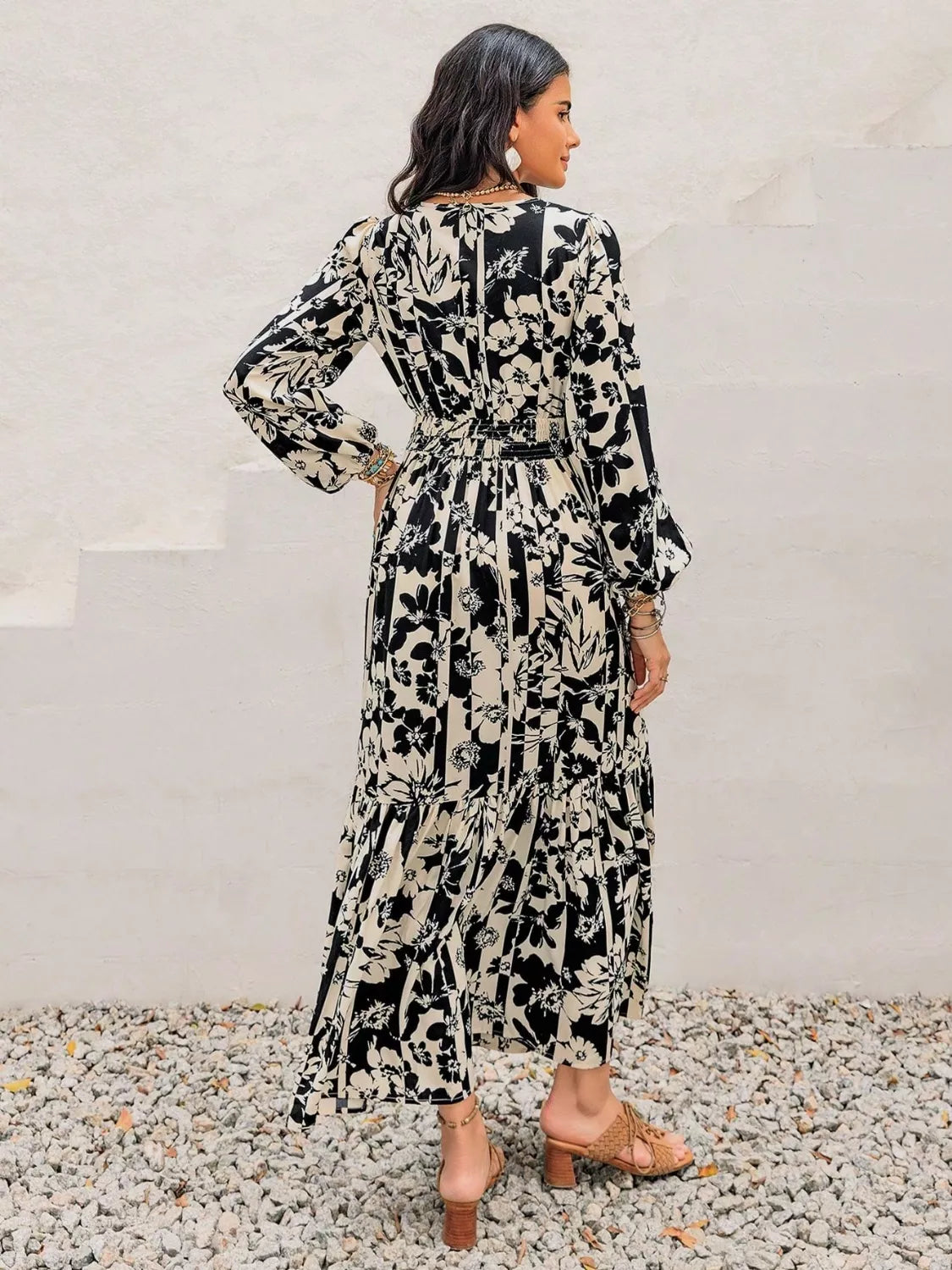 Plus size floral balloon sleeve maxi dress in black detail of the neckline