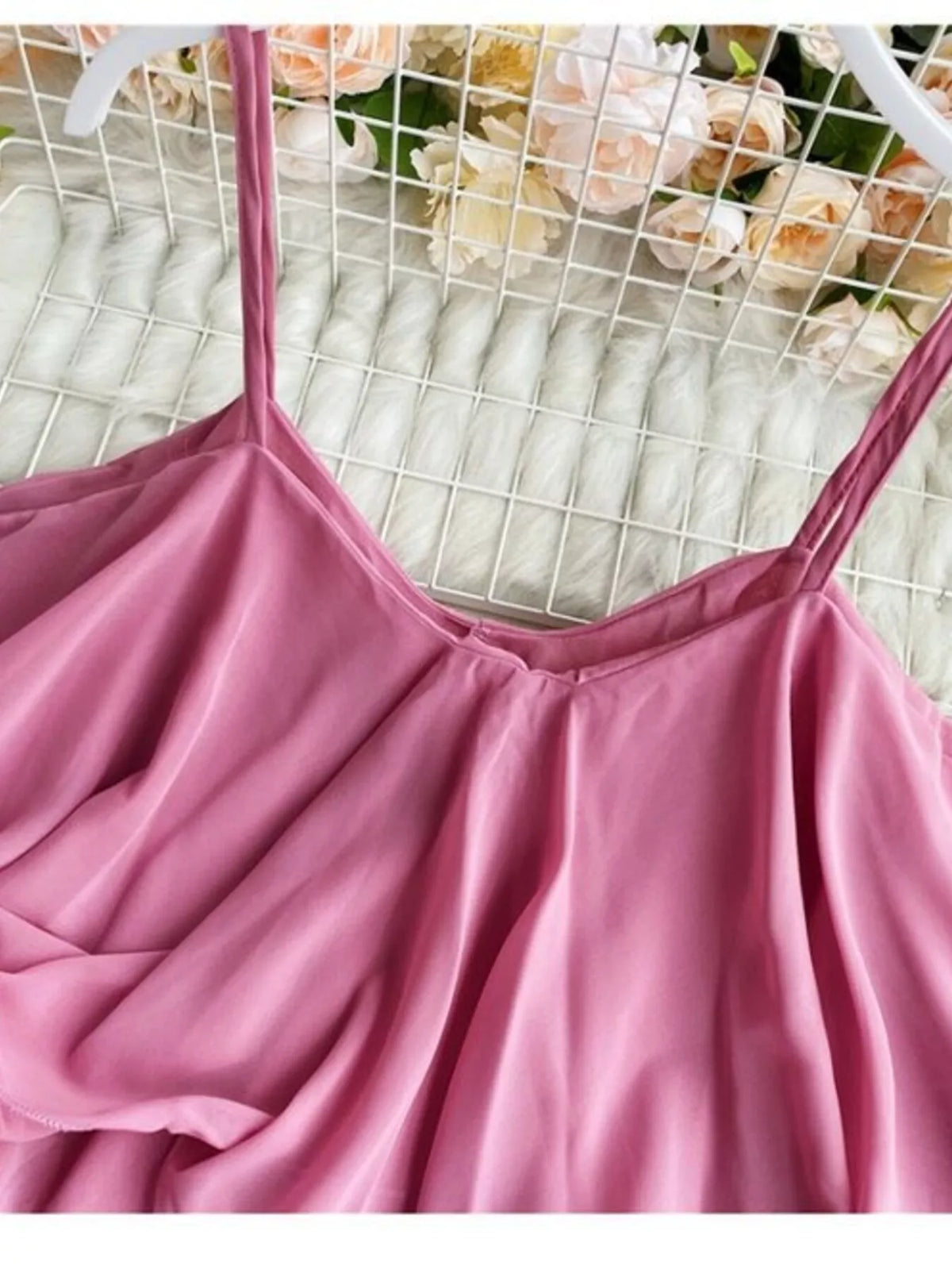 Ruffled flowy cami top side view