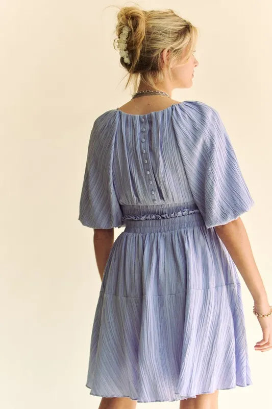 Back Button Puff Sleeve Mini Dress in Lavender back view