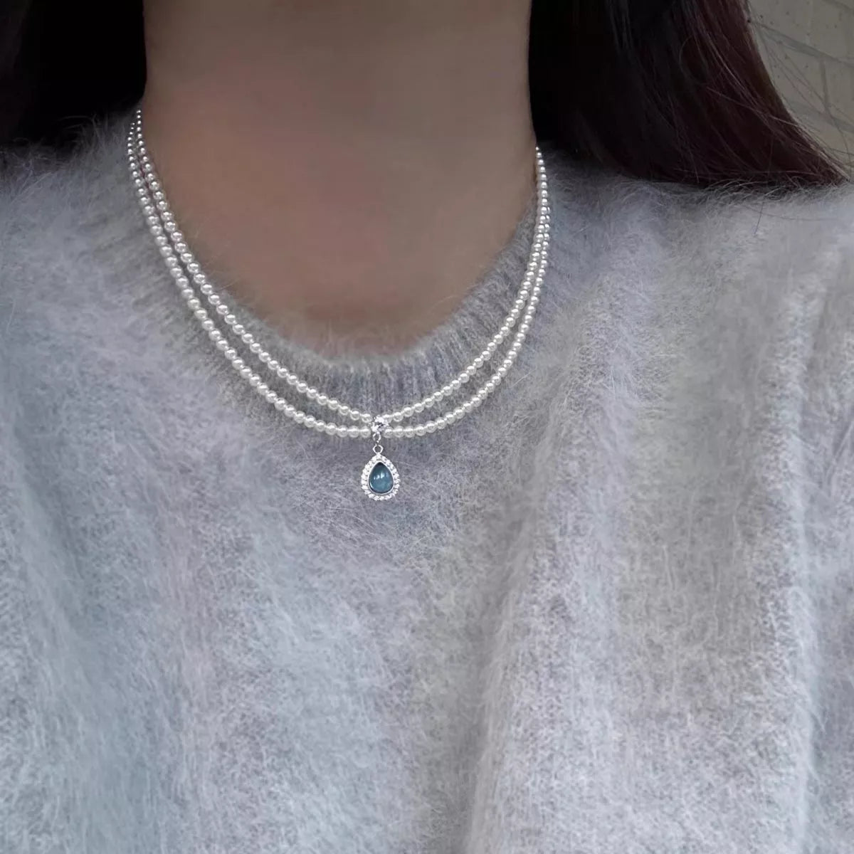 Double layered pearl teardrop pendant necklace back view