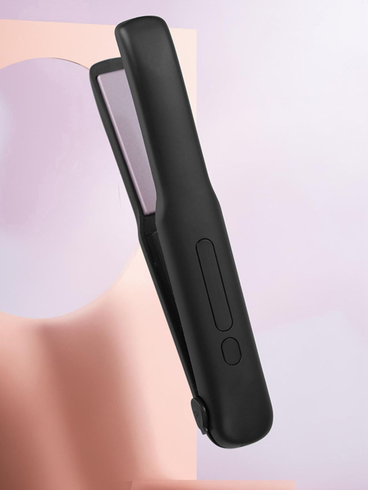Straightener held in hand