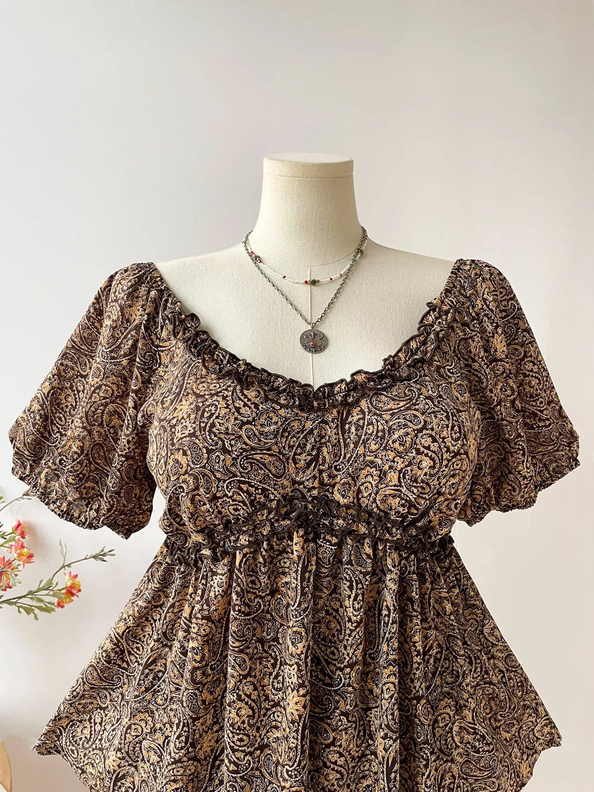 Paisley blouse showing frill and ruched detail