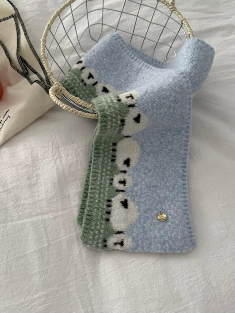 Sheep pattern knitted scarf wrapped around the neck