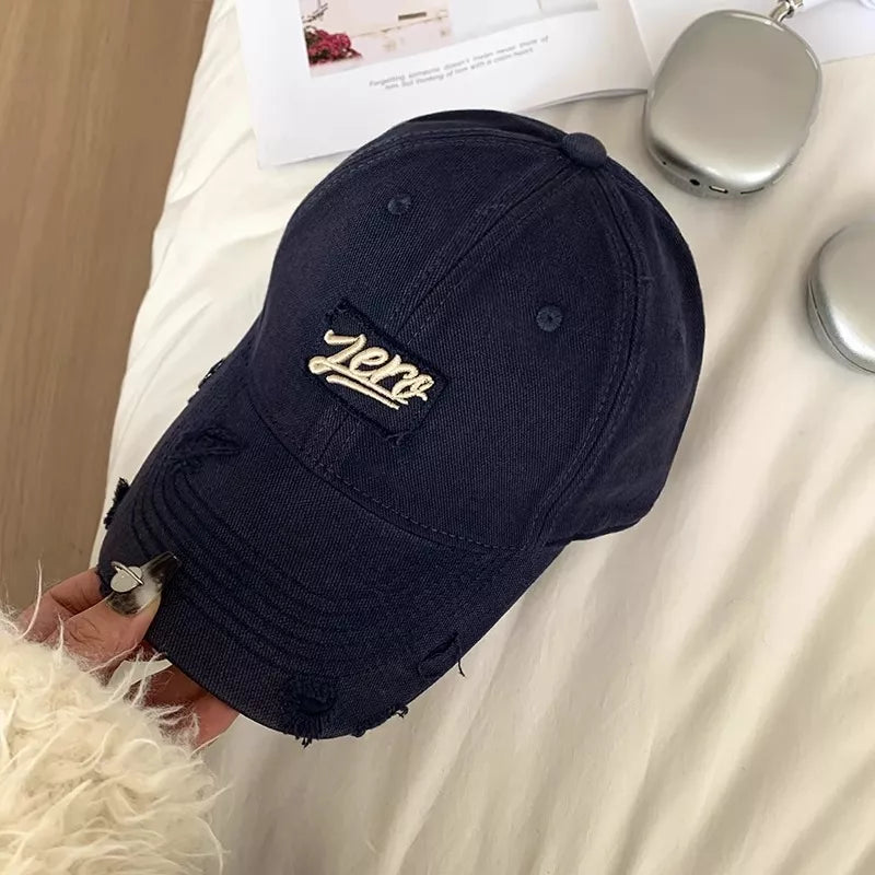 Washed cotton cap crown and stitching texture