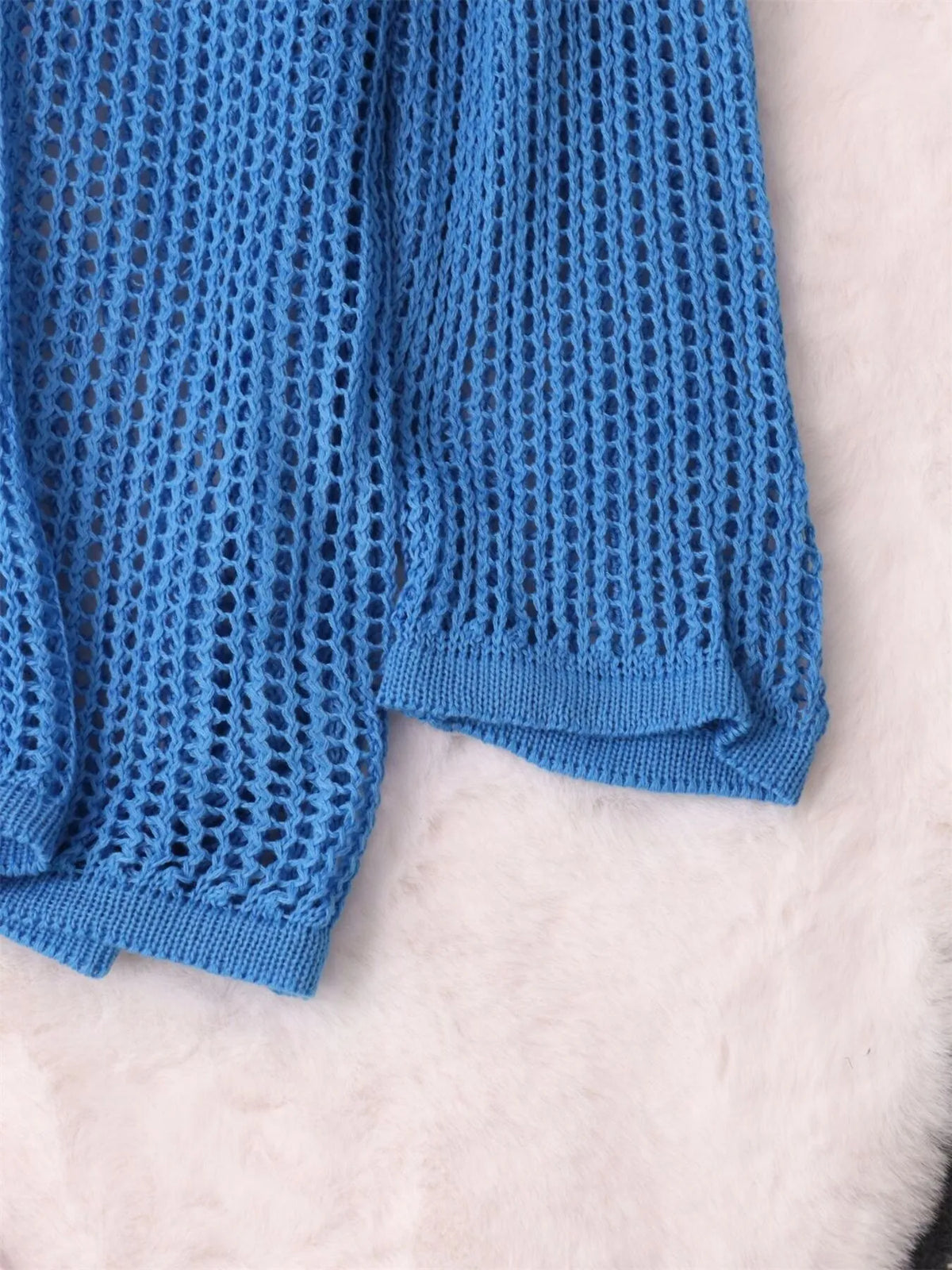 openwork relaxed knit cover up fabric detail
