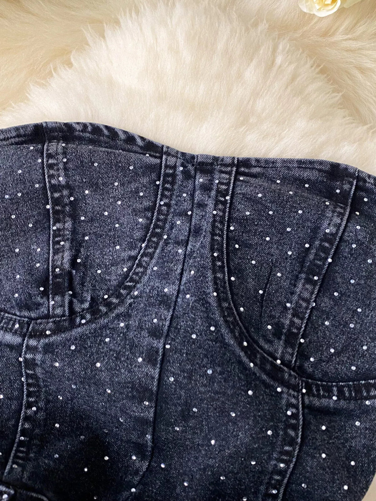 Blue strapless denim romper with diamante detail front view