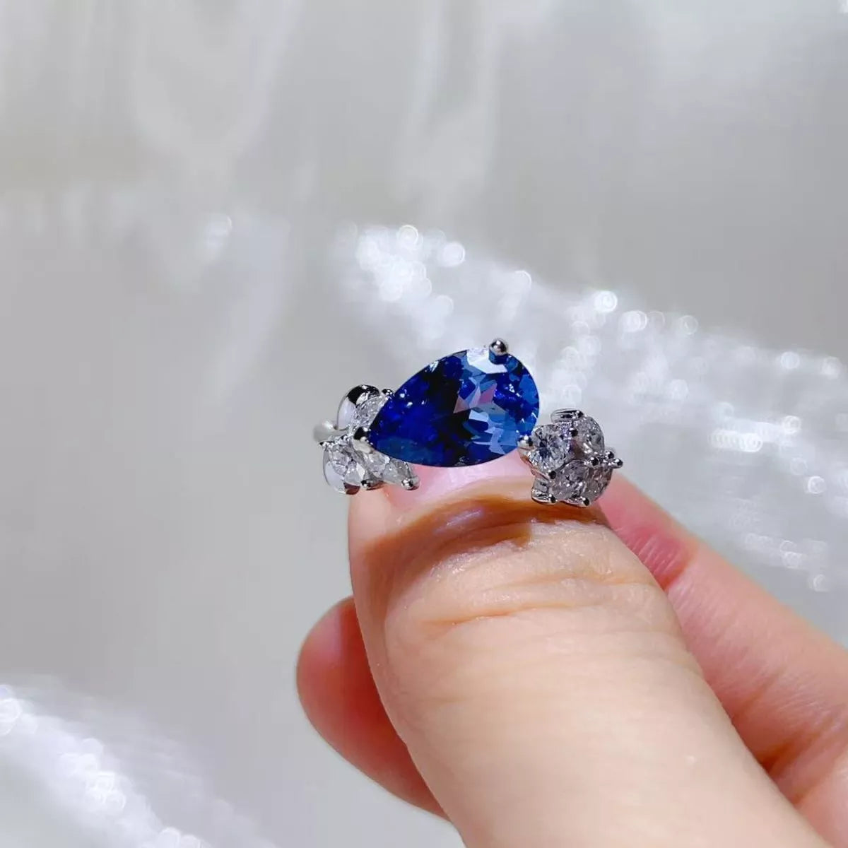 Starglow 3 carat royal blue moissanite ring in sterling silver, front view