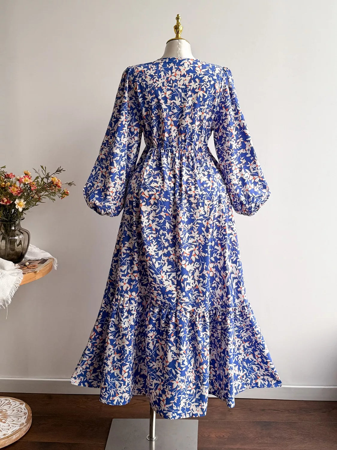 Plus size floral V neck long sleeve maxi dress close up of the neckline