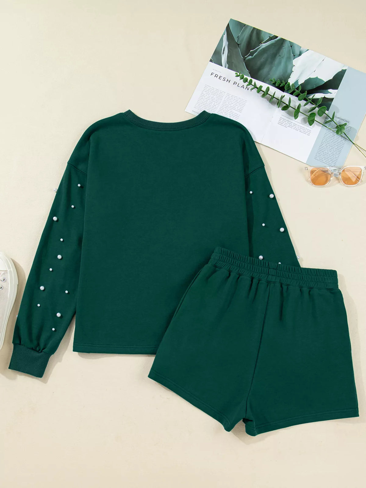 Pearl embellished drop shoulder top detail