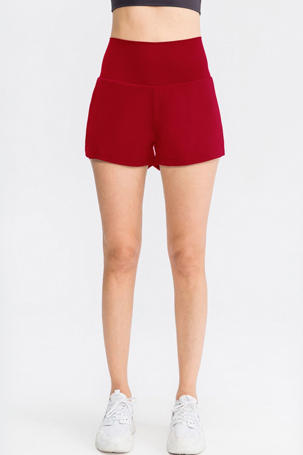 Wide waistband sports shorts with pockets close up detail