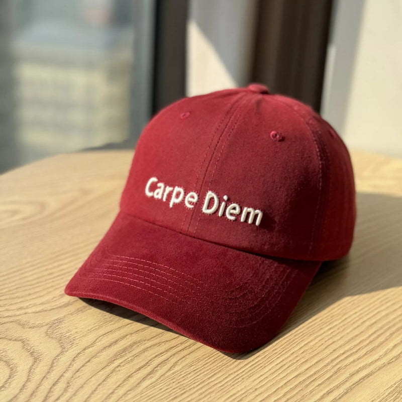 Red embroidered classic baseball cap front view
