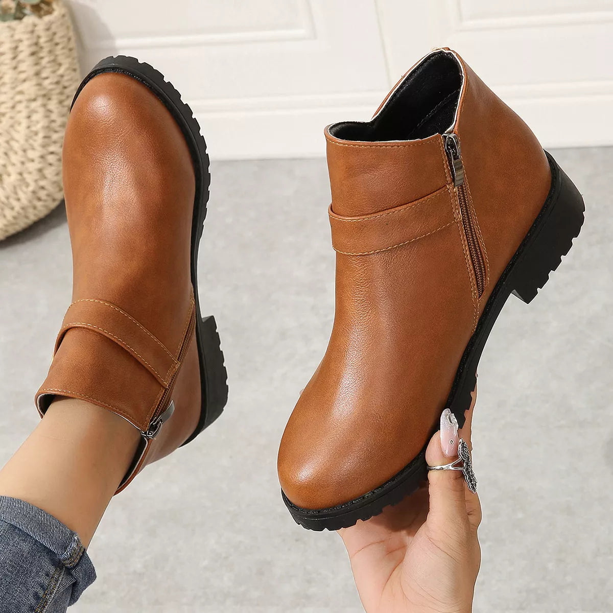 Buckle accent ankle boots sole and outsole view