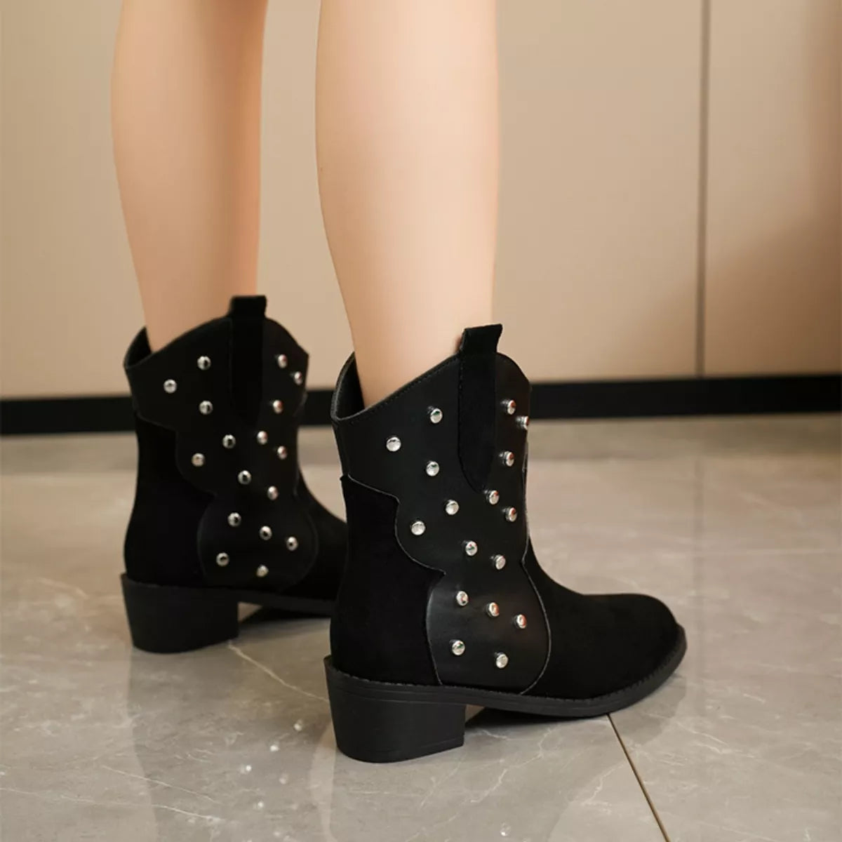 Studded western ankle boots toe close up